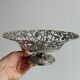 Silver-plated openwork metal stand