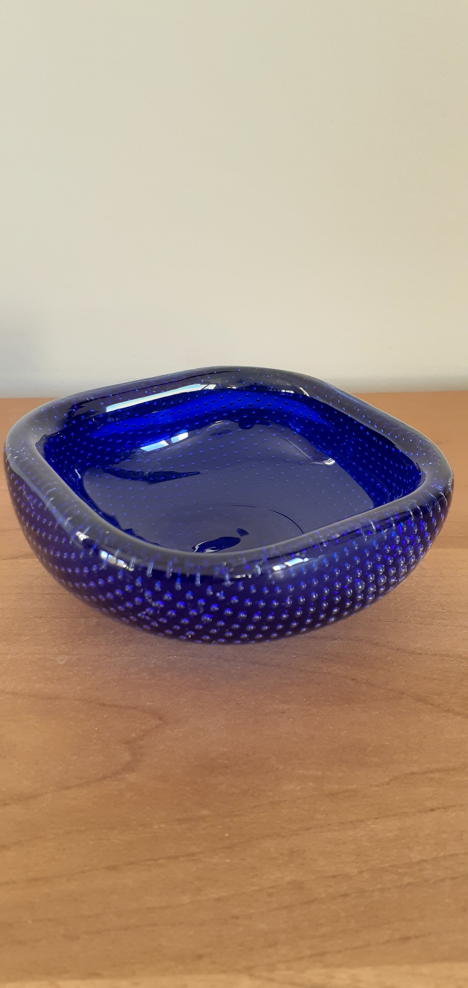 Empty blue bubbled glass pocket