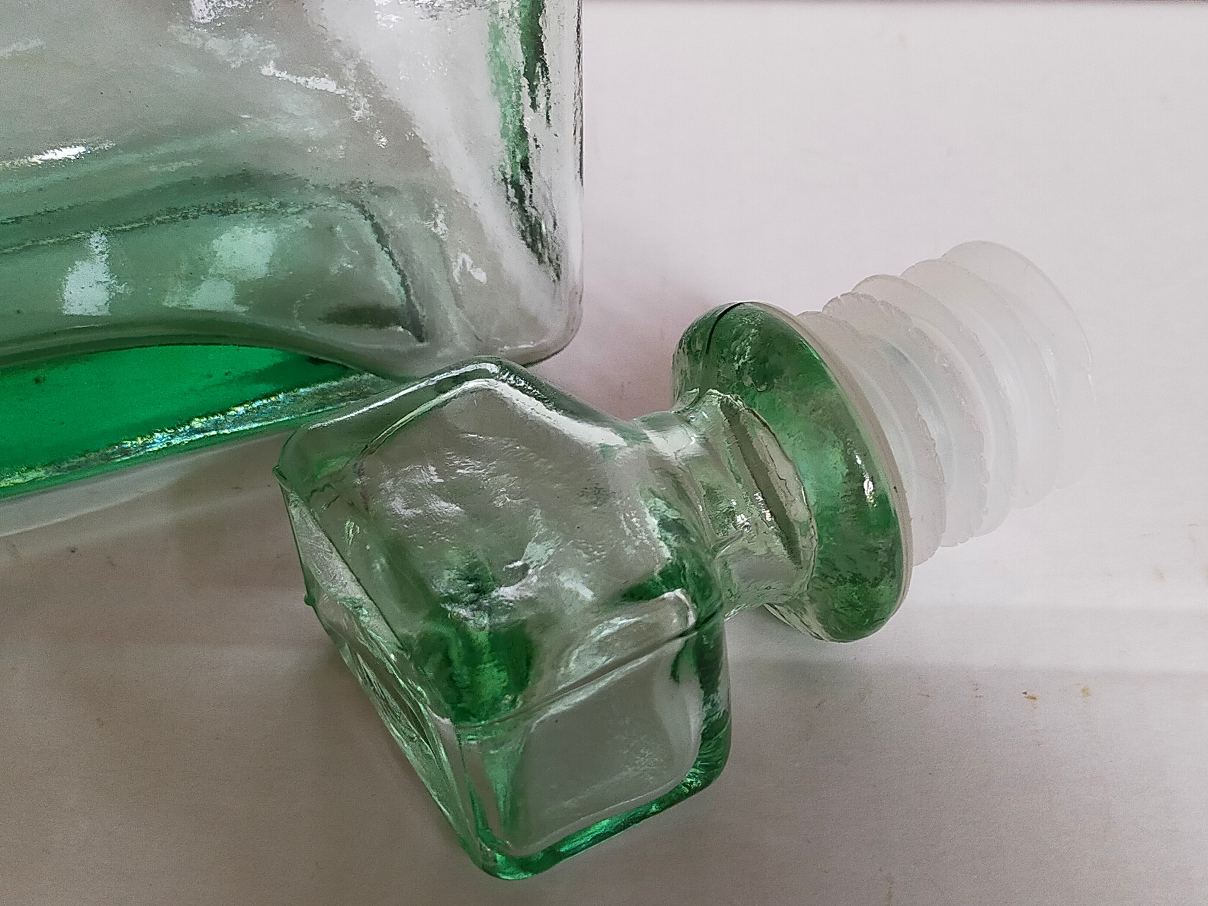 Vintage green glass whiskey decanter