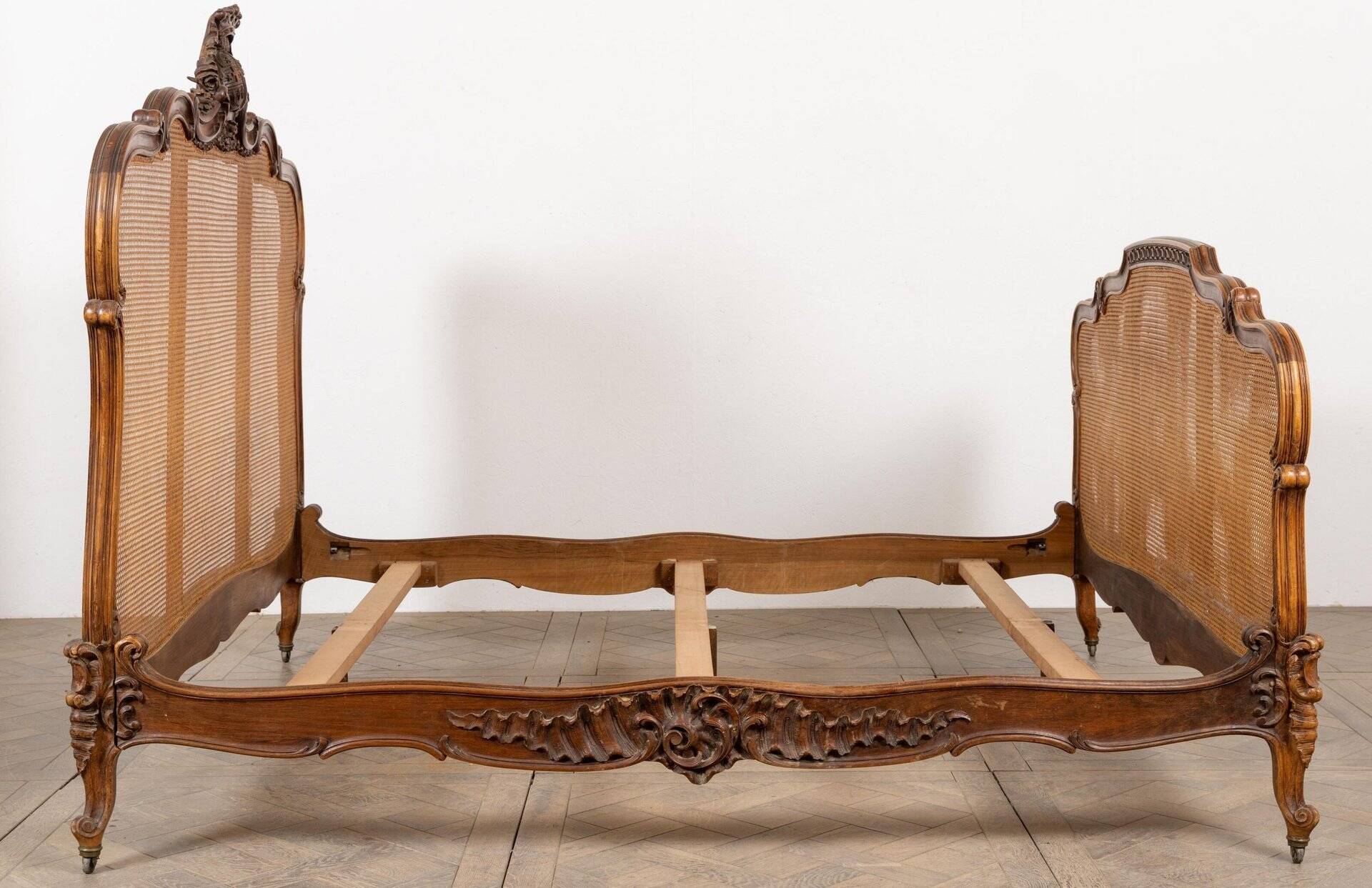 Louis XV style bed in carved and caned beech