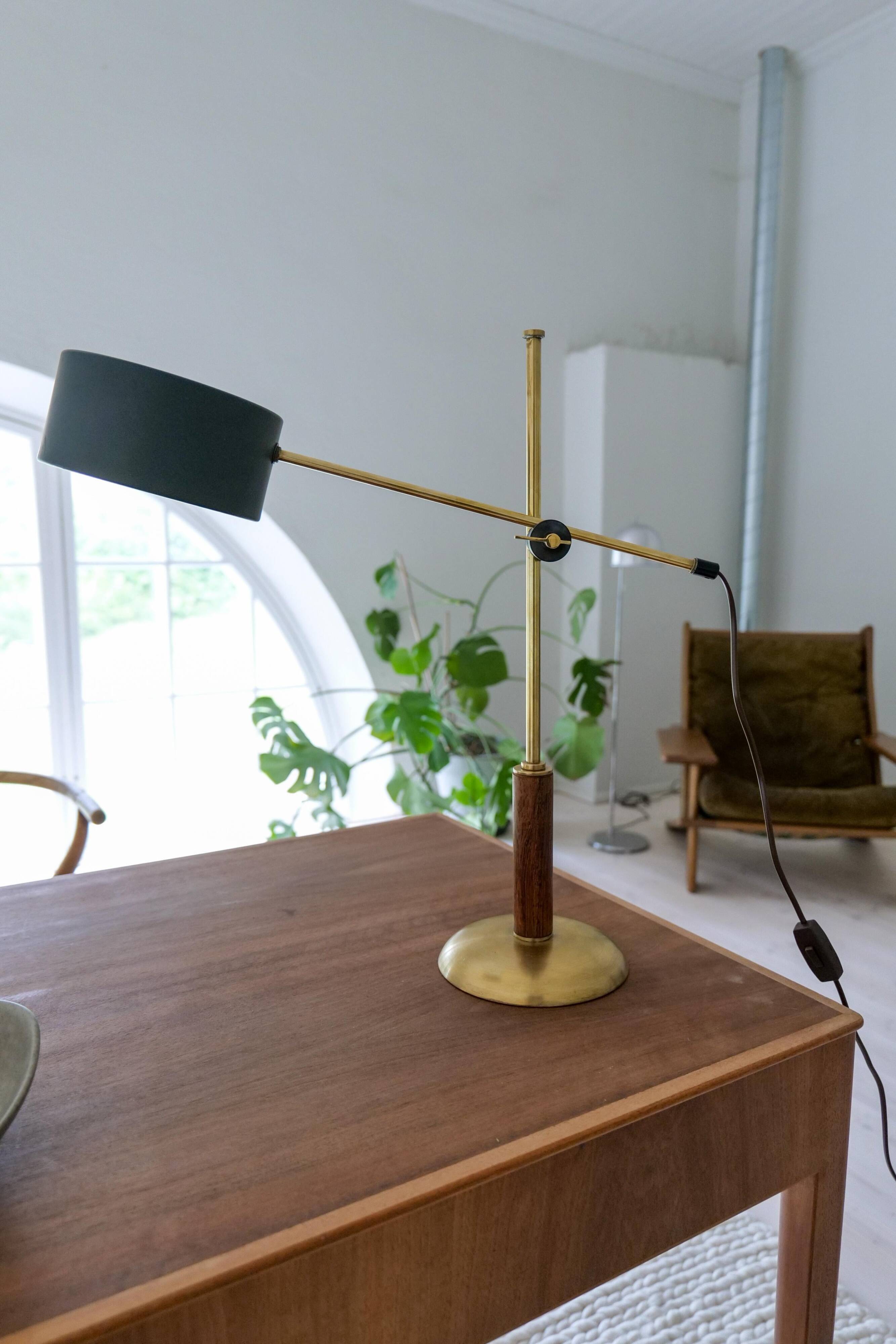 Mid-century modern table lamp in brass and walnut, rare by Einar Bäckström, Sweden.