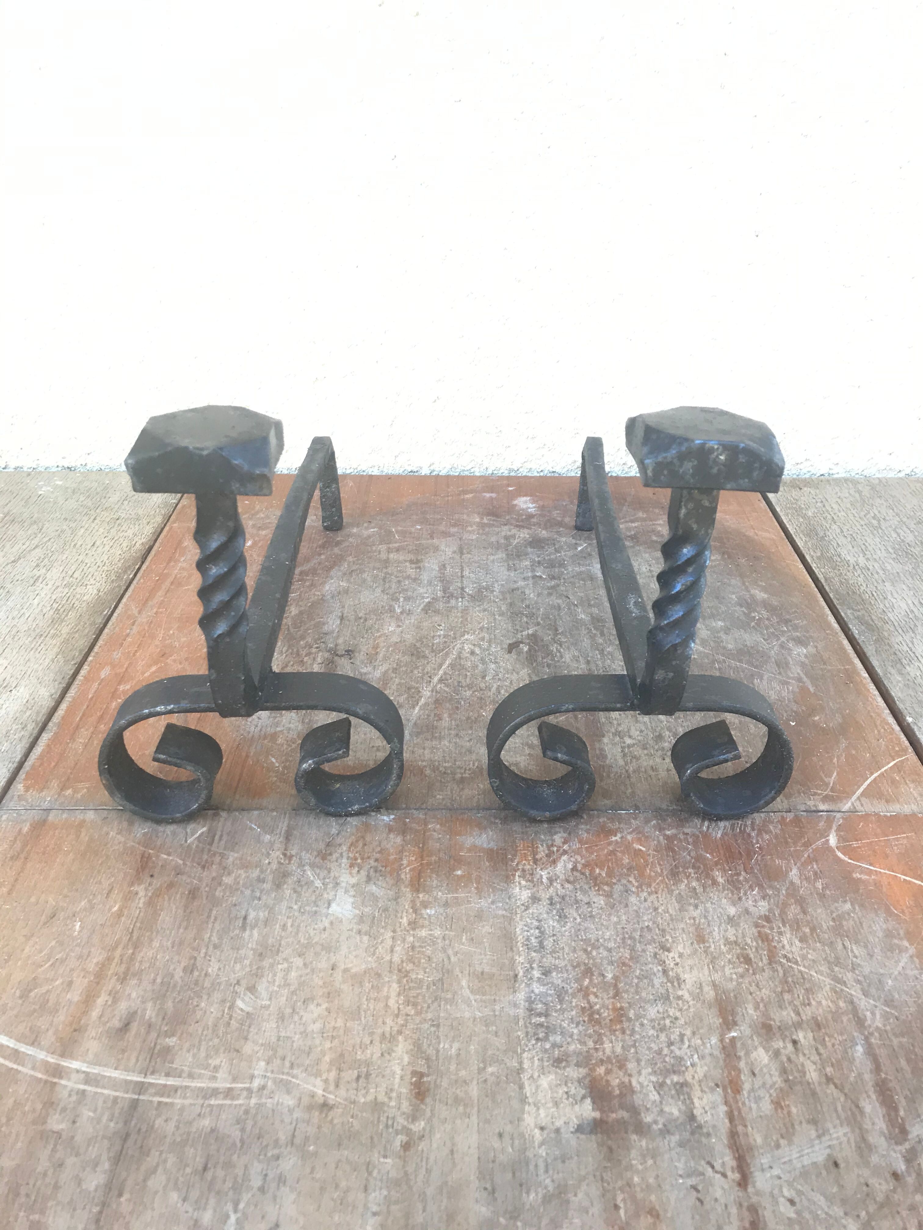 Old pair of twisted wrought iron andirons