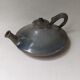 Handcrafted ceramic teapot in Japandi style.