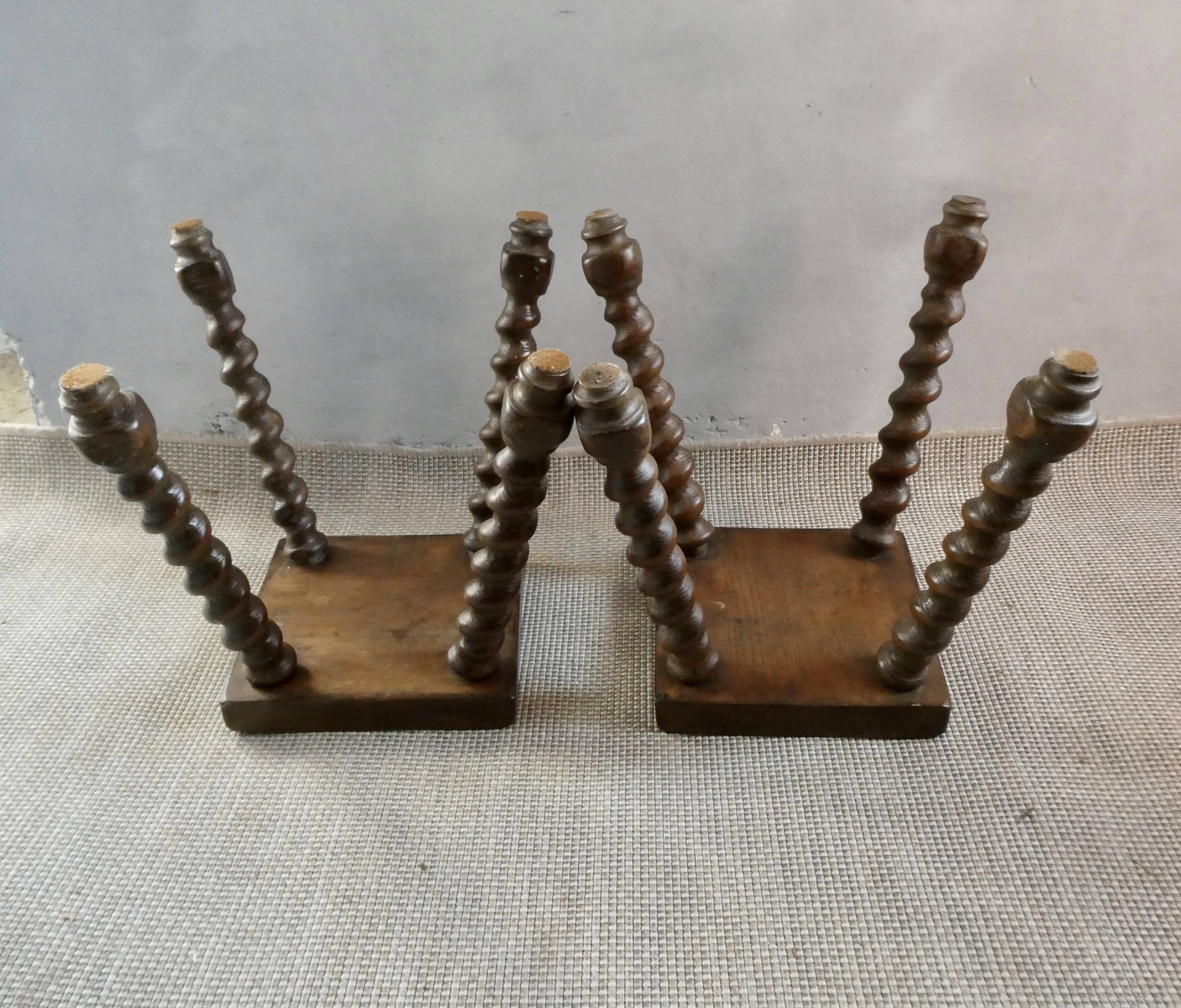 Pair of solid wood stools, carved legs