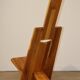 Sculptural brutalist armchair in solid elm, 1980.