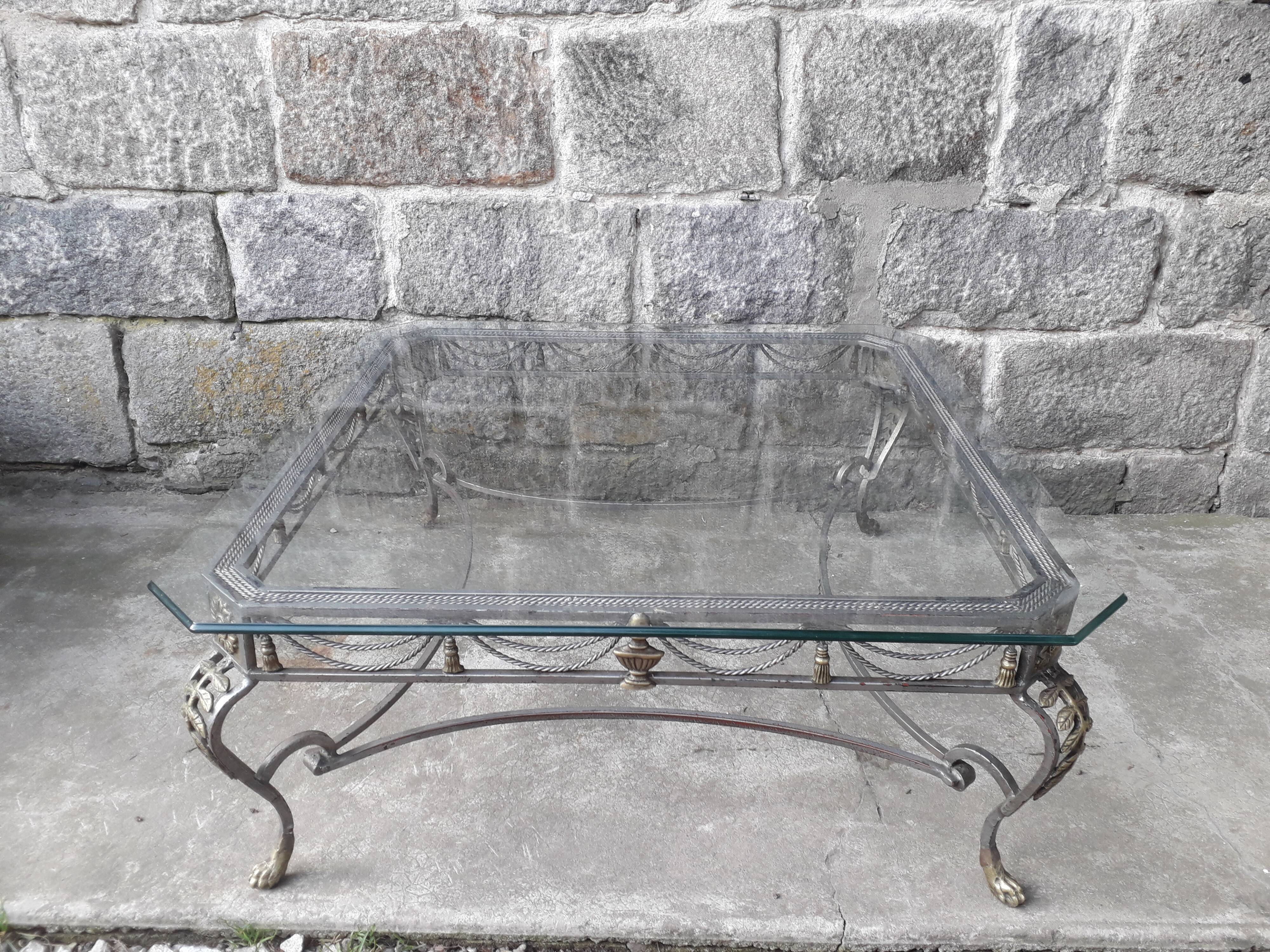 Large coffee table, wrought iron footing glass tray