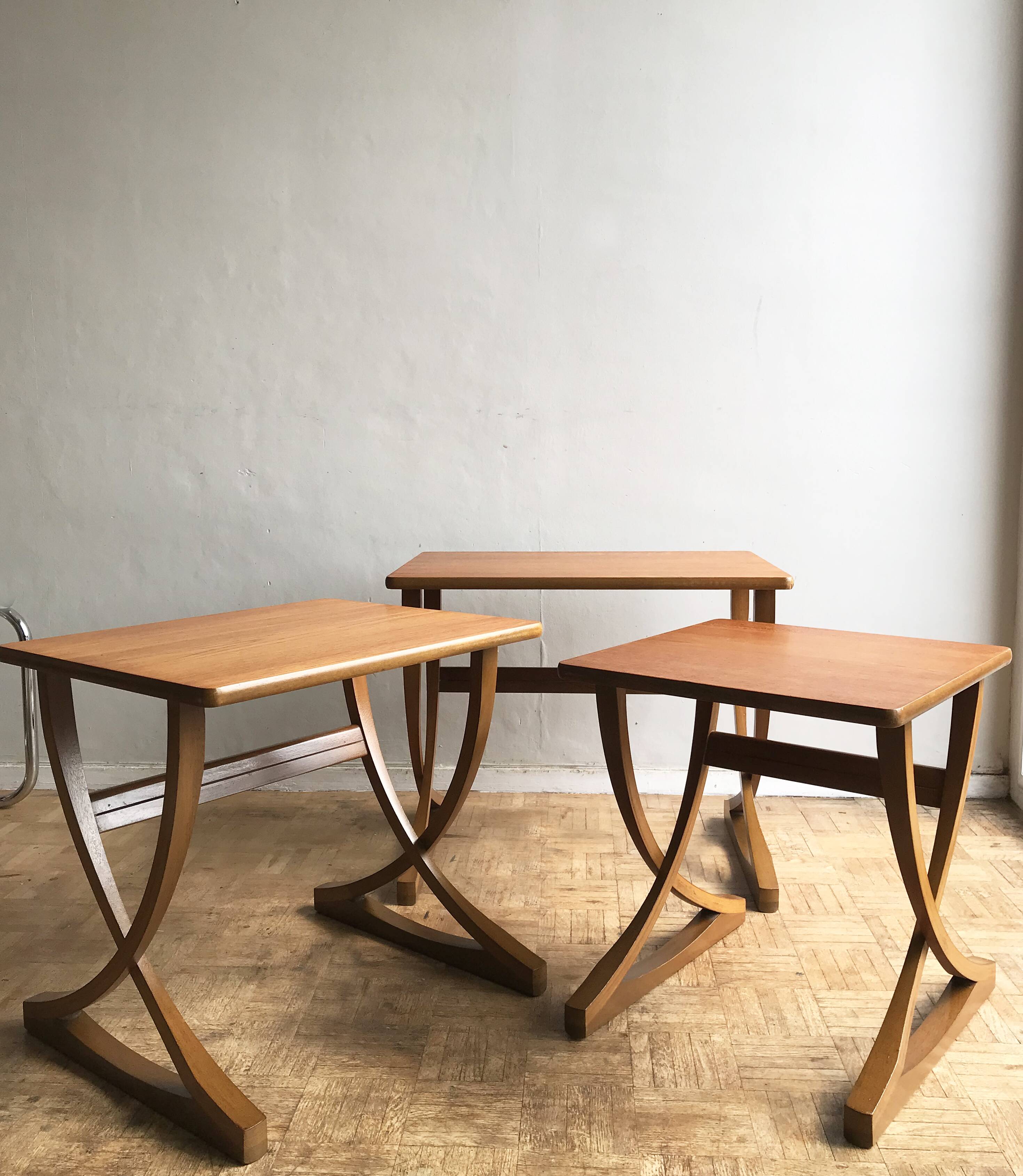 Set of 3 nesting tables from Nathan editions in teak and beech.