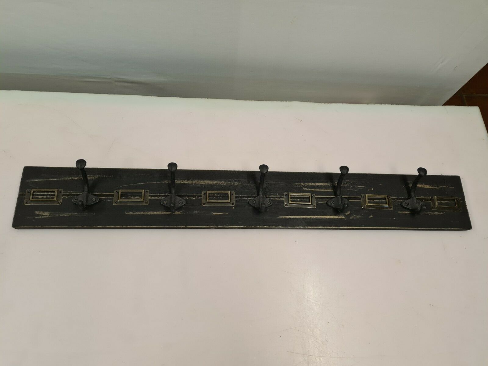 School coat rack with black patinated labels