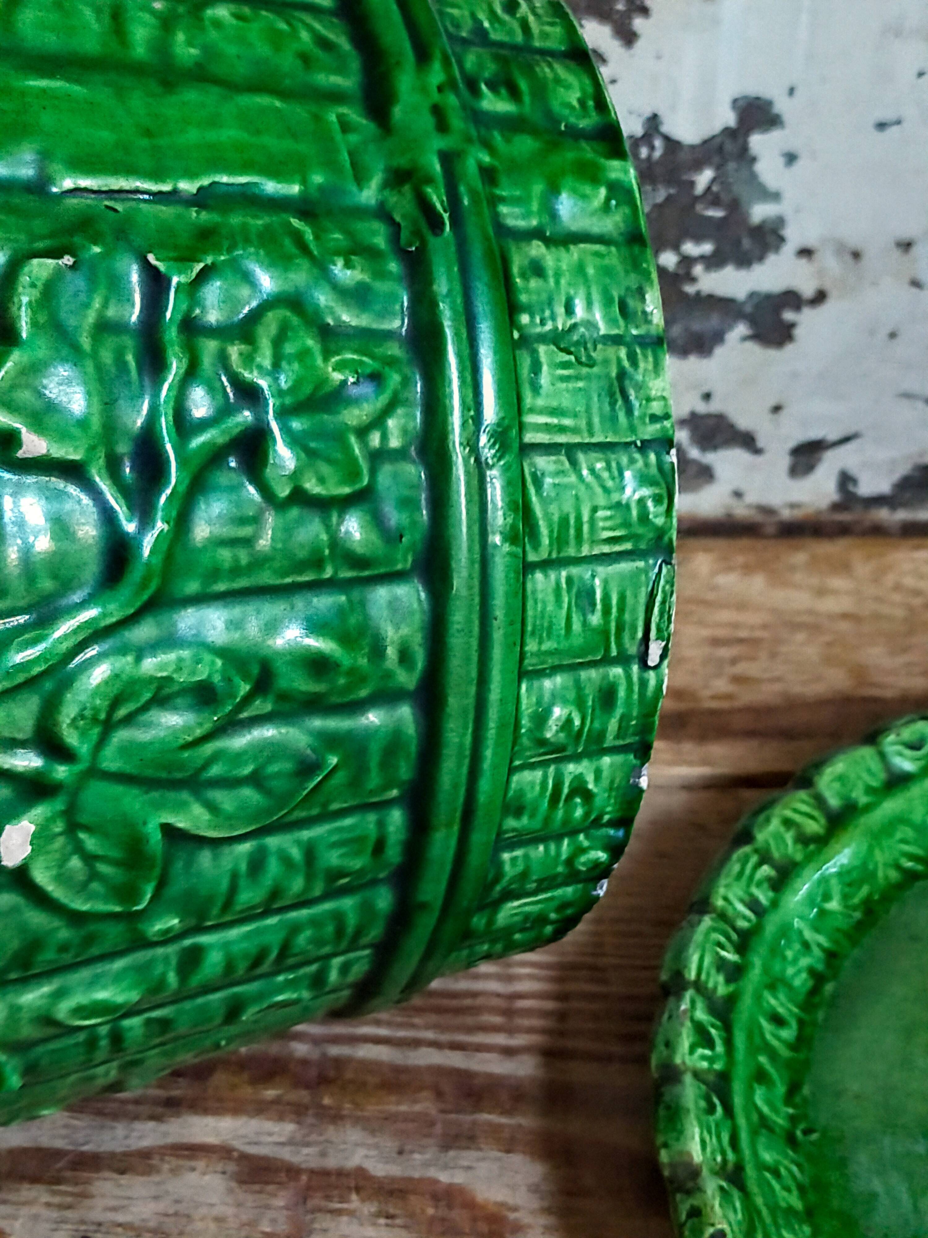 Flower pot and saucer in slip by G. De Bruyn 19th century