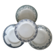 Mismatched vintage flat plates in green and blue ironstone.