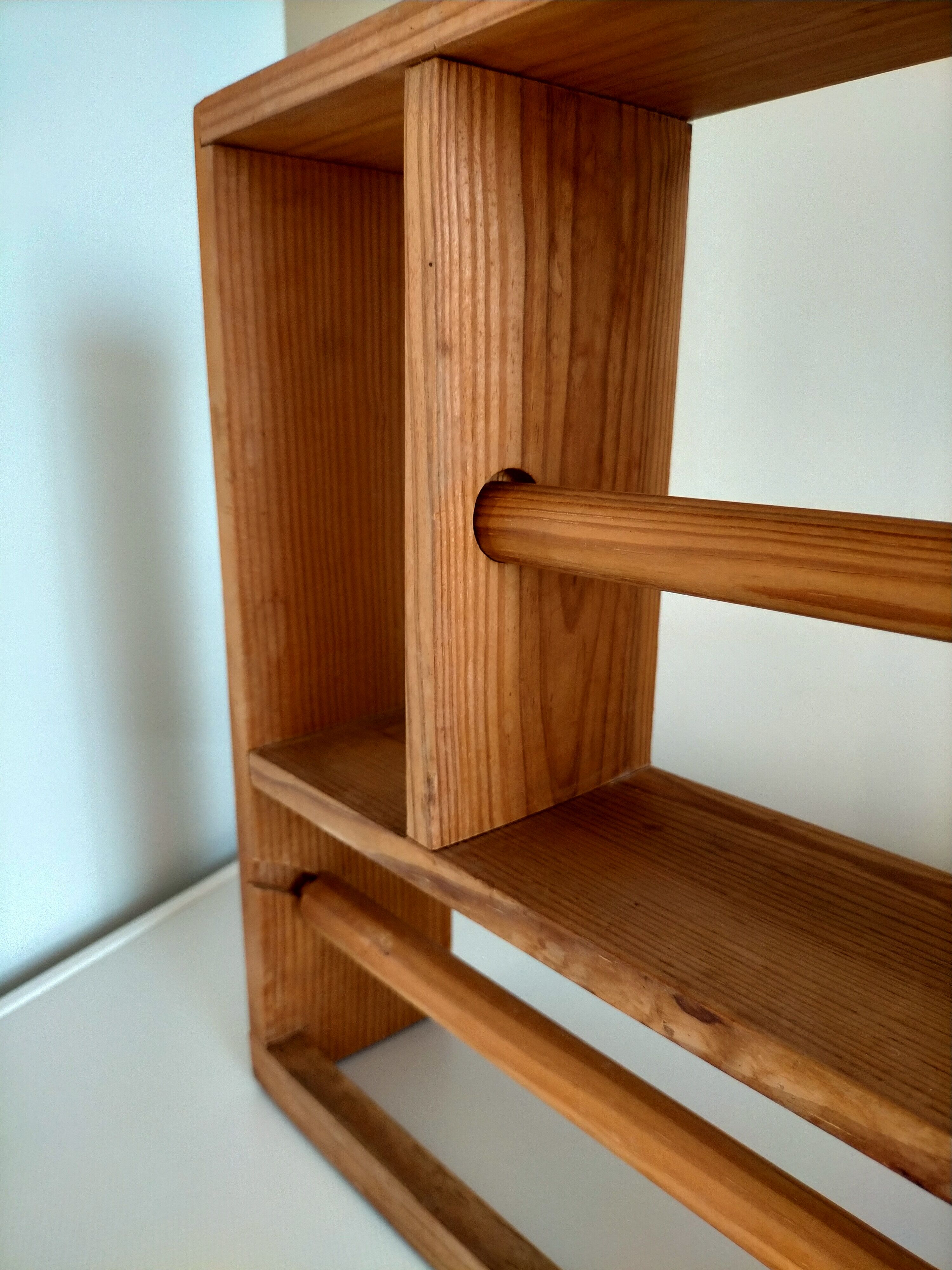 Wooden shelf with unroller wipes everything