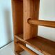 Wooden shelf with unroller wipes everything