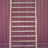 Old vintage wooden animal barrier, wall espalier, plant holder