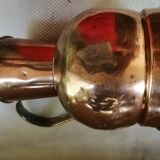 Cruche antique en cuivre rouge