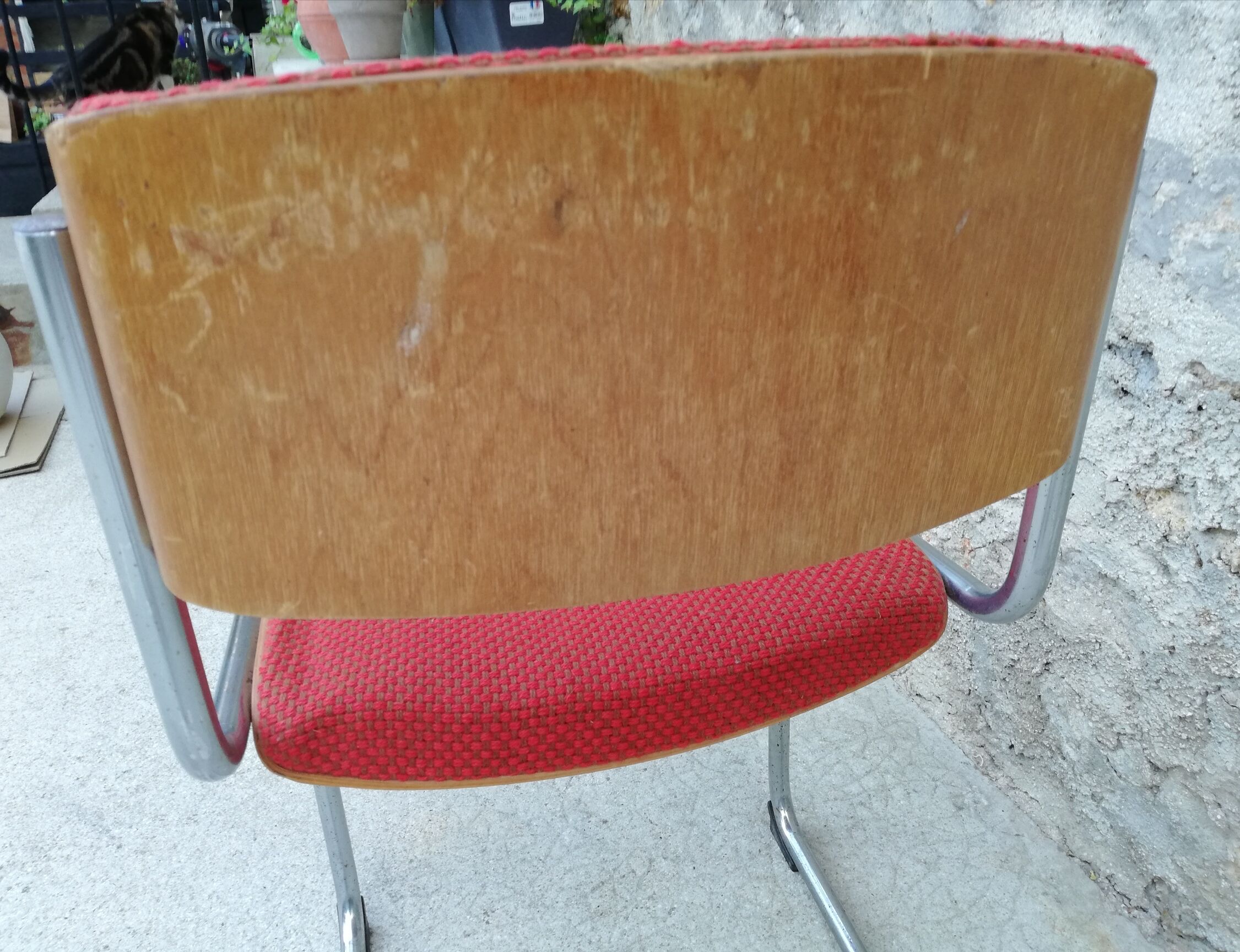 Red chair cantilever chrome tubes