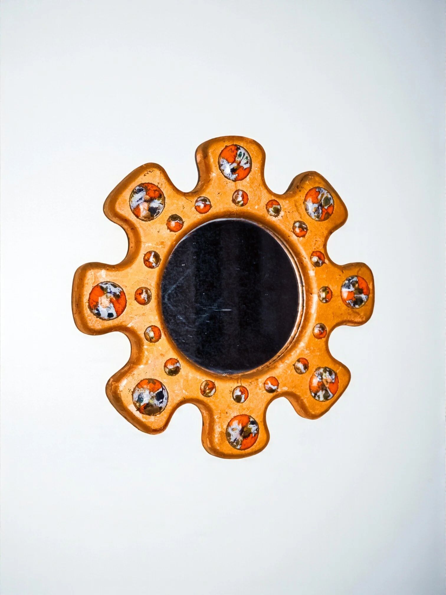 Sun-shaped modernist enamel mirror by J. Capo Esmaltes, Spain, 1970s