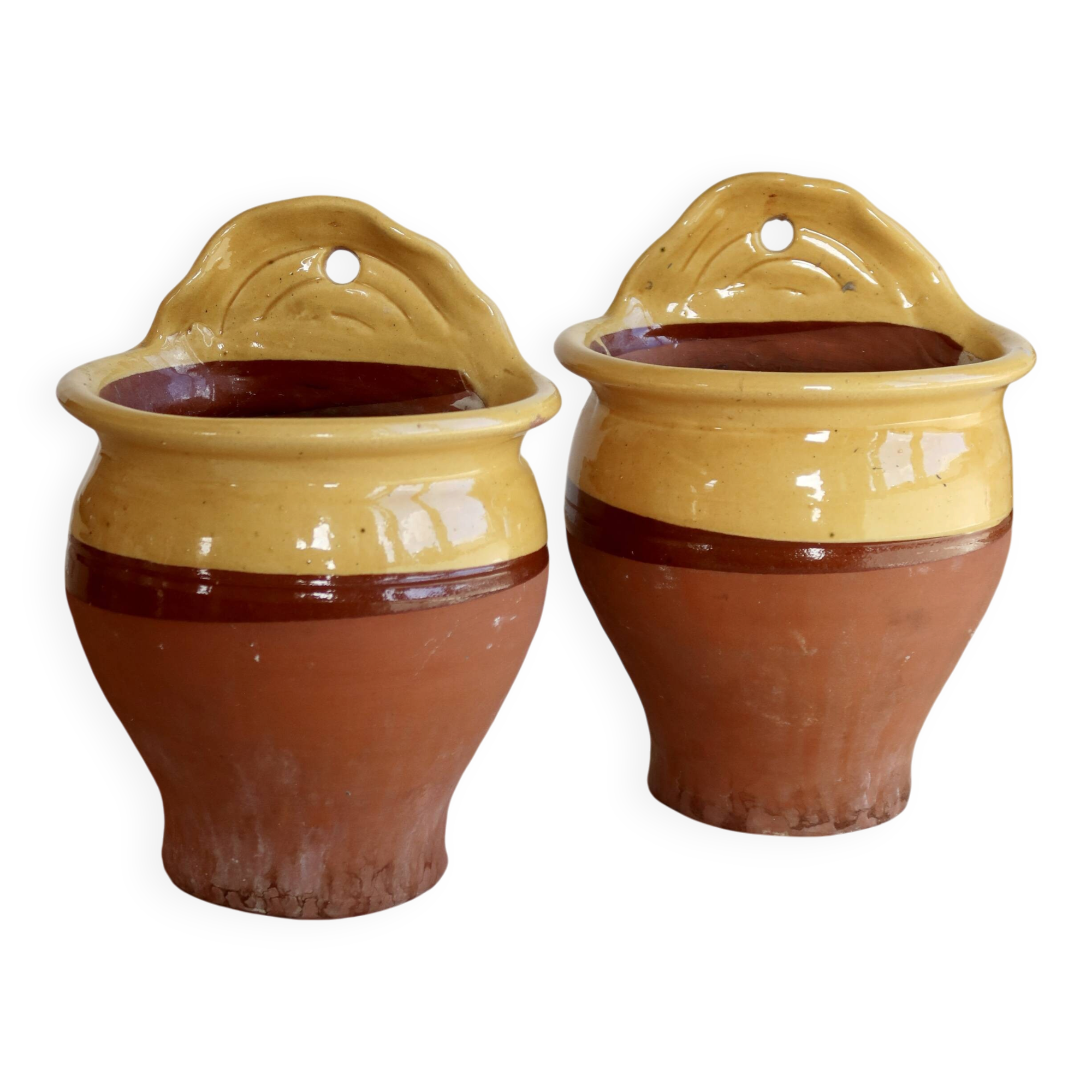 Pair of vintage wall planters in yellow glazed stoneware.