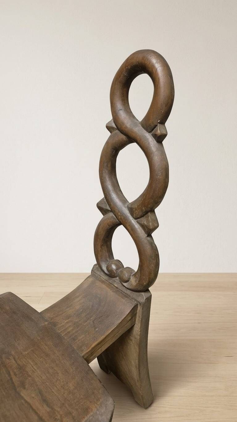 Vintage sculptural wooden table and two chairs, hand-carved loop backrests