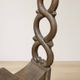 Vintage sculptural wooden table and two chairs, hand-carved loop backrests