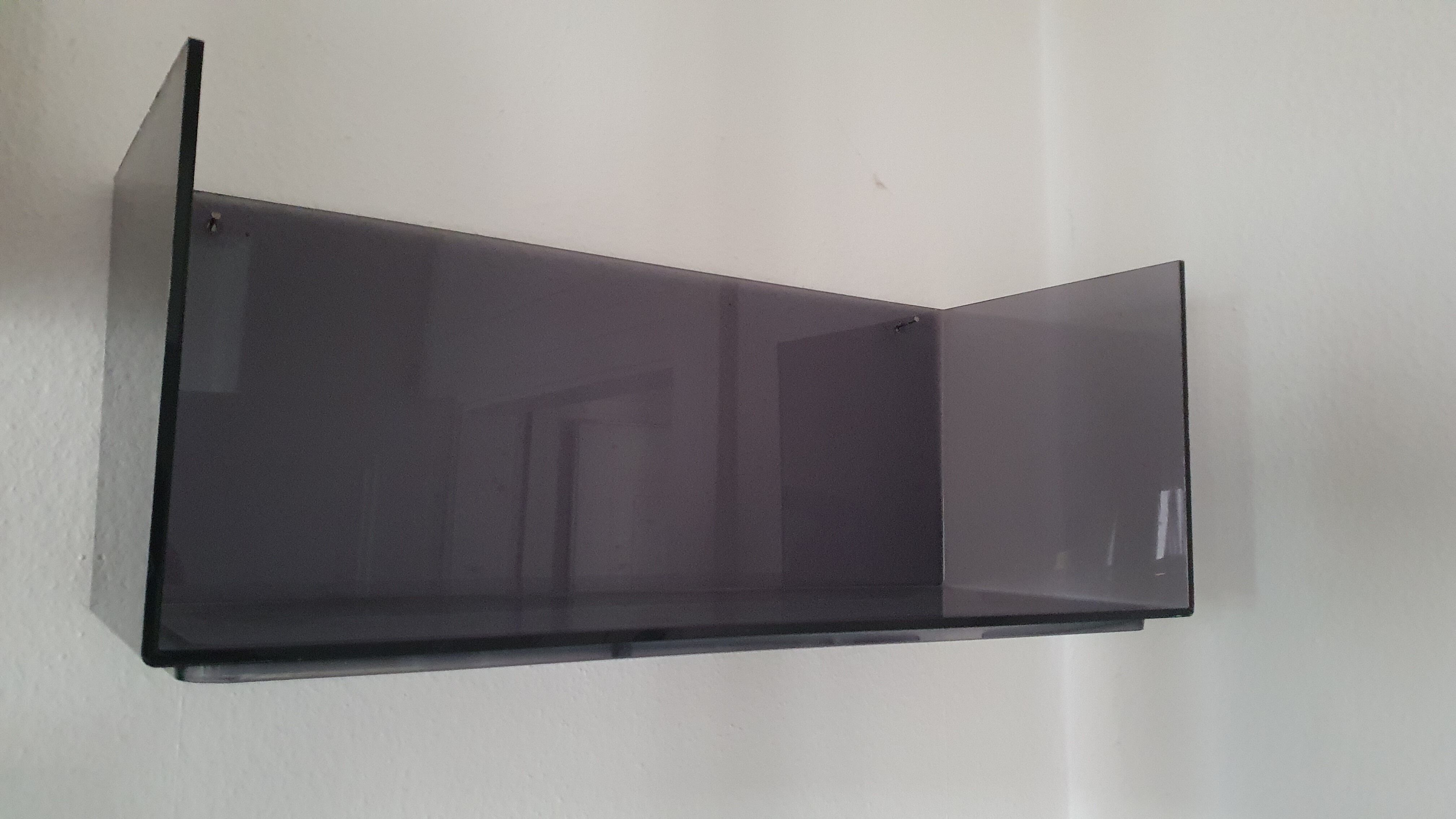 Plexiglas wall shelf