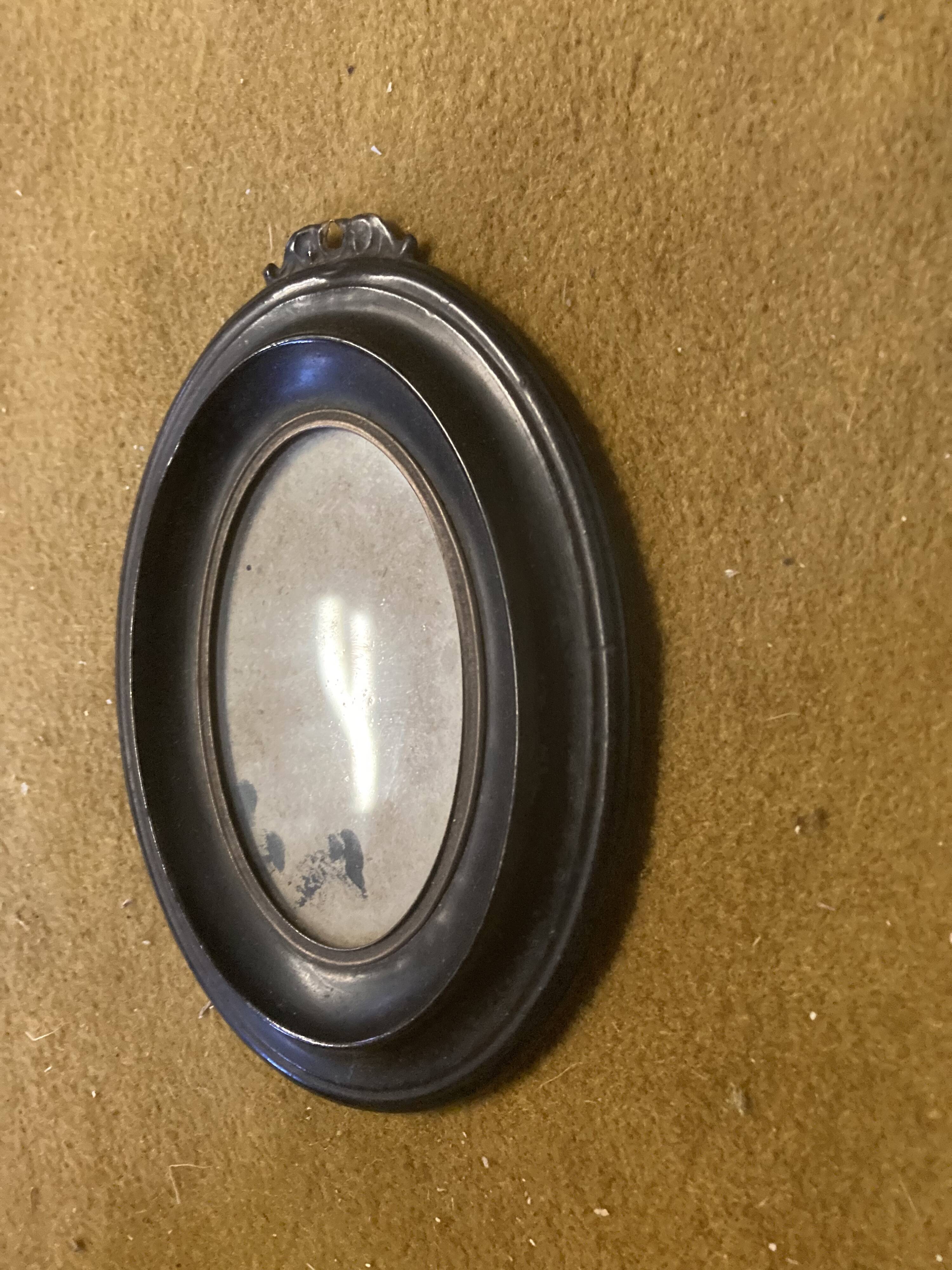 Blackened brass Nap III frame.