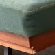 Vintage wooden sofa – modernist design, green mottled fabric