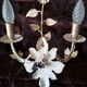 White glazed metal wall light with leaf and flower decor, 2 lights