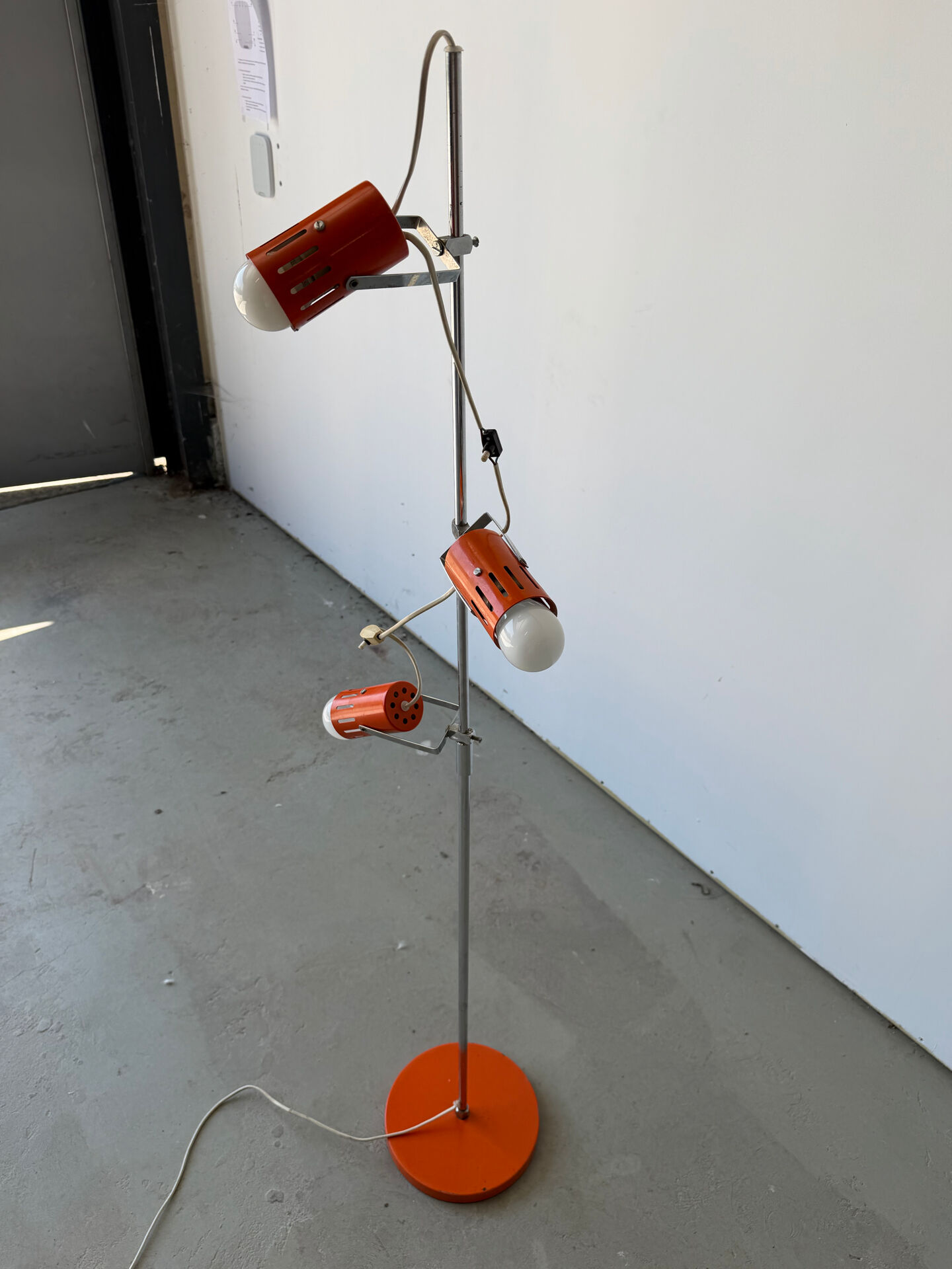 Three-spot floor lamp, Italian design, chrome and vintage orange.