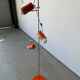 Three-spot floor lamp, Italian design, chrome and vintage orange.