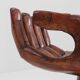 Sculptural wooden hand chair