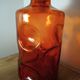 Red carafe with molded glass with hollow bubbles