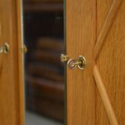 Oak wardrobe with Saint-Gobain mirror from the 1960s.