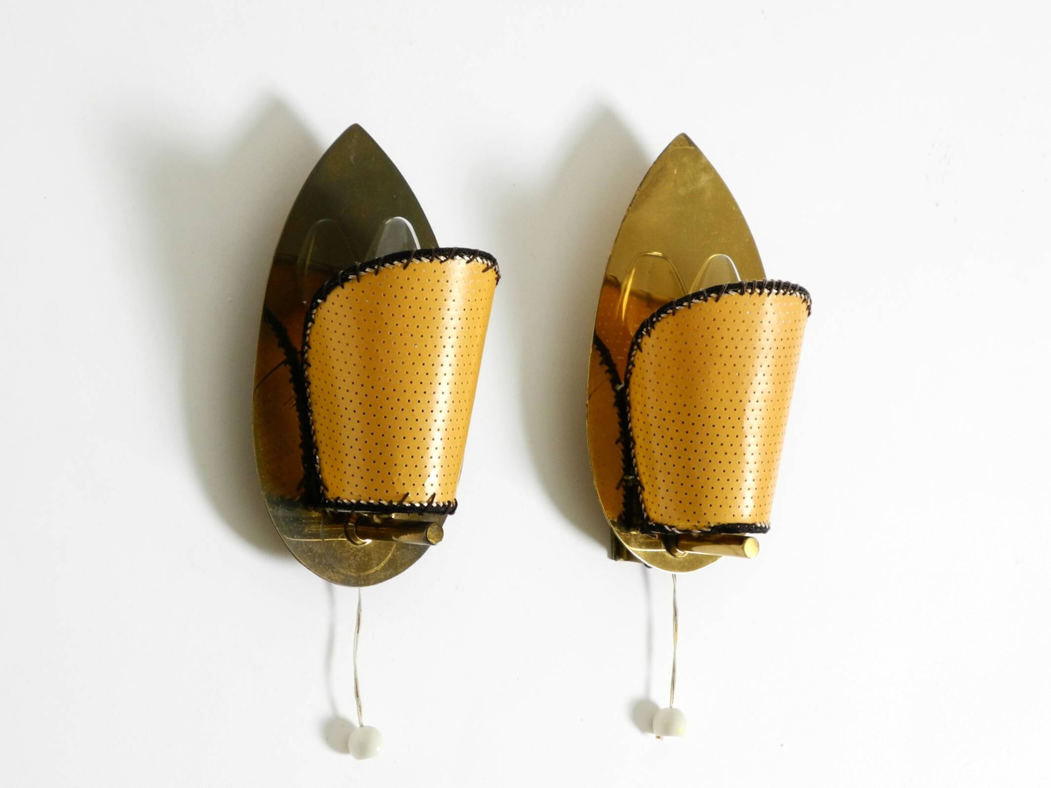 Two enchanting original Mid Century Modern brass wall lamps