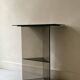 Vintage console in smoked glass and textured organic brown, 70s design.