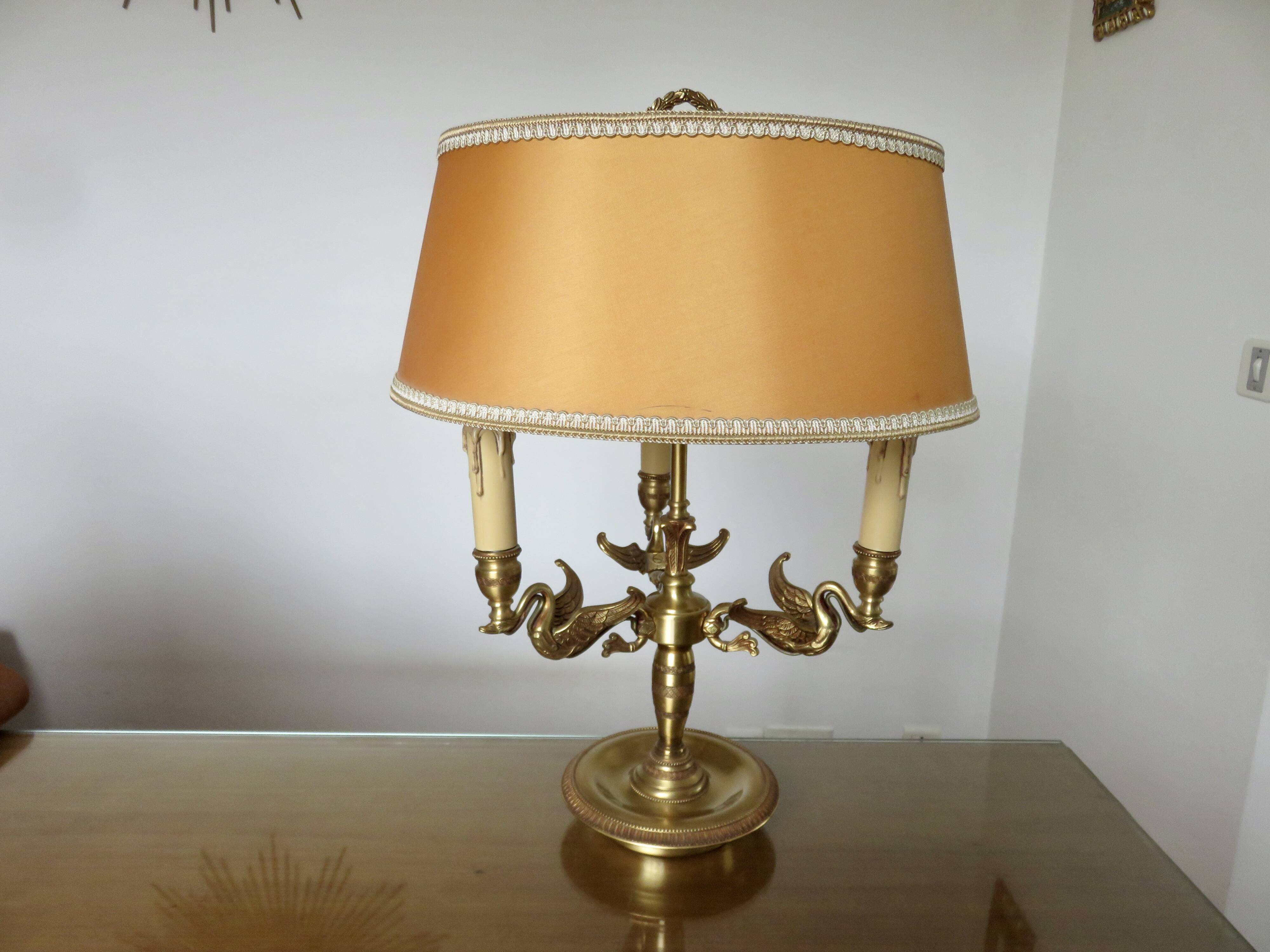 Lucien Gau empire style lamp in solid bronze gilded with bright gold "with swans"