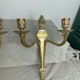 Deux bougeoirs muraux en bronze style Empire