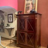 Cabinet, wardrobe or mahogany and ormolu wine bar in French Empire style with four doors.