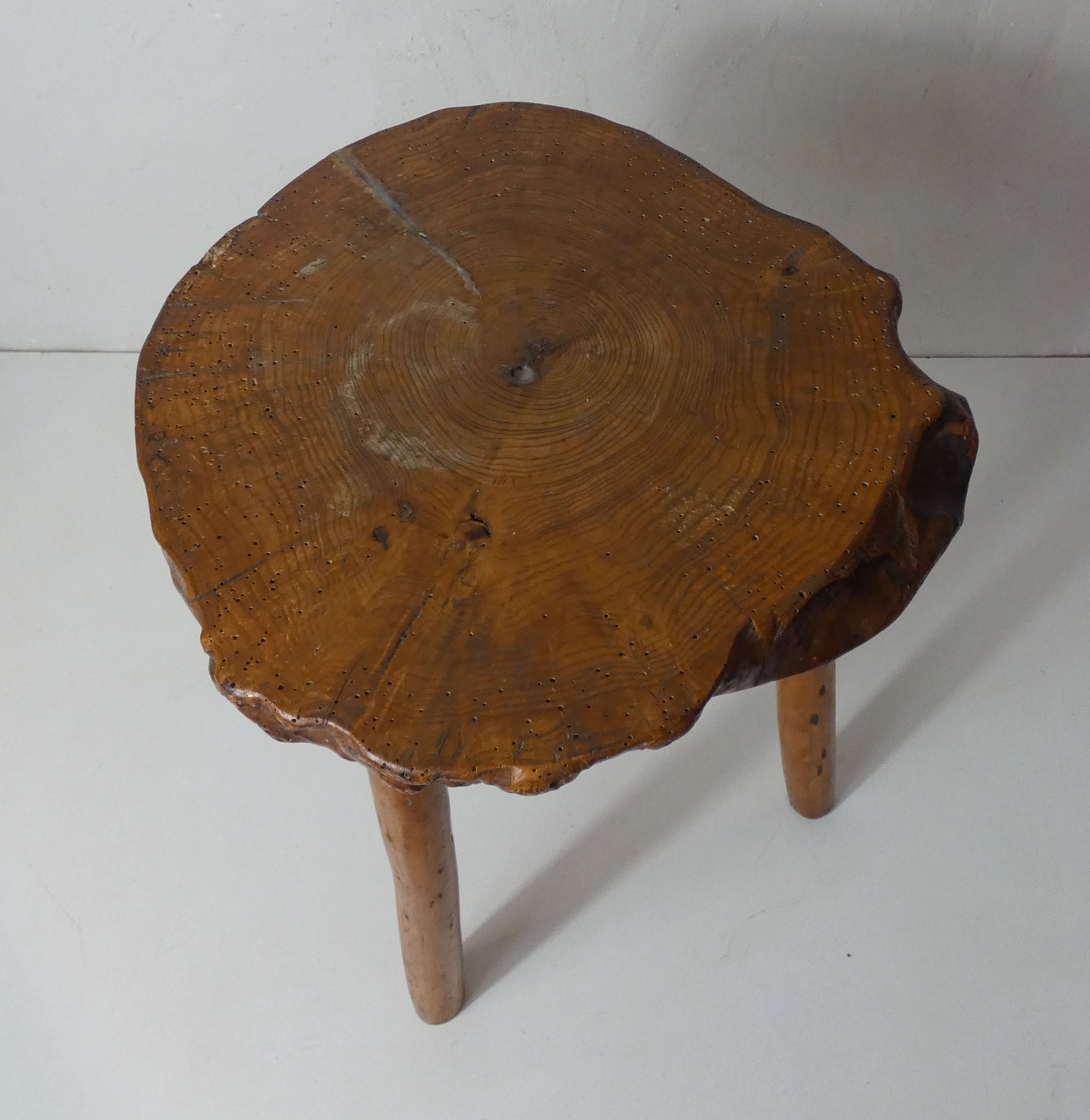 Brutalist side table tripod in vintage wood