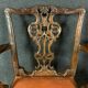 Pair of George II armchairs in 19th century mahogany era