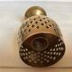 Lattice brass catchall and candlestick.