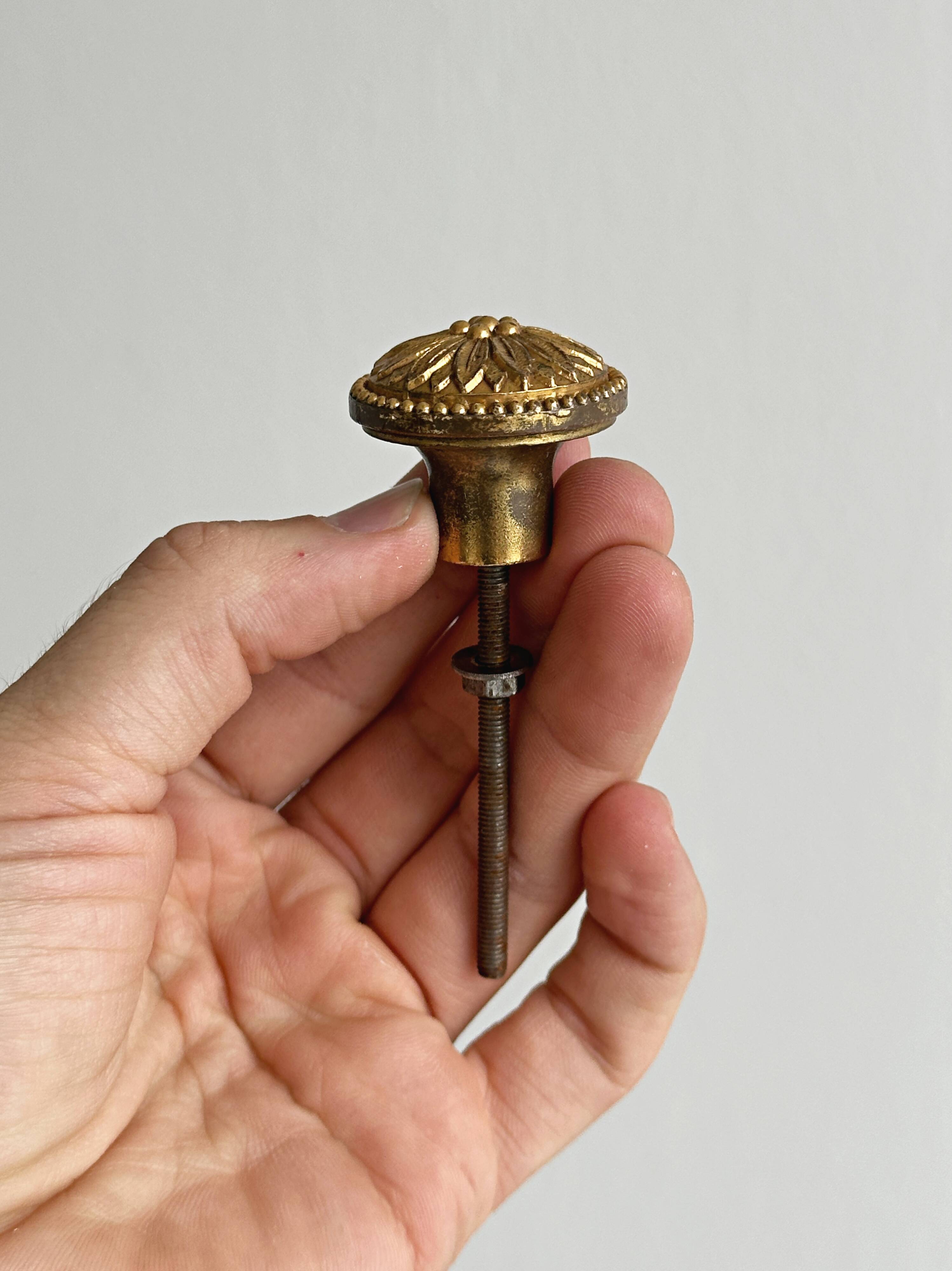Set of 5 antique brass furniture knobs
