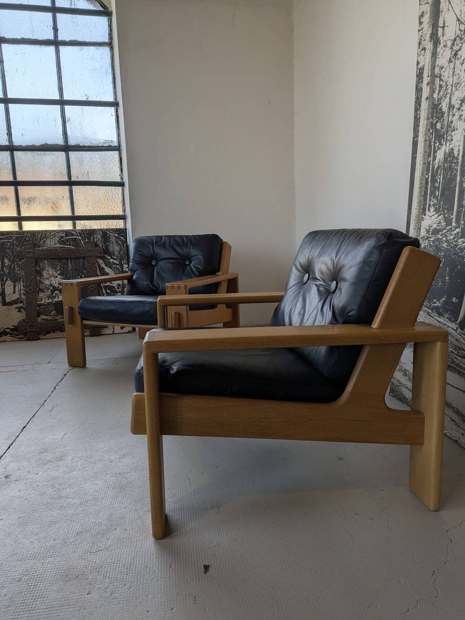 Pair of raw oak and leather armchairs by Esko Pajamies for Asko, Finland.