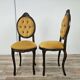 Pair of early 1900s wooden chairs with padded seat and backrests