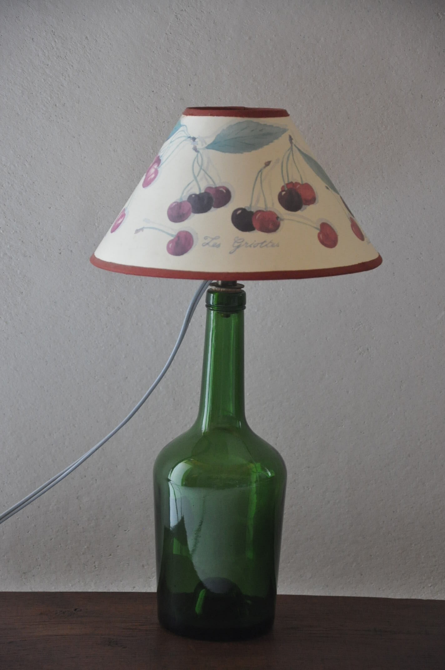 Lampe bouteille en verre vert