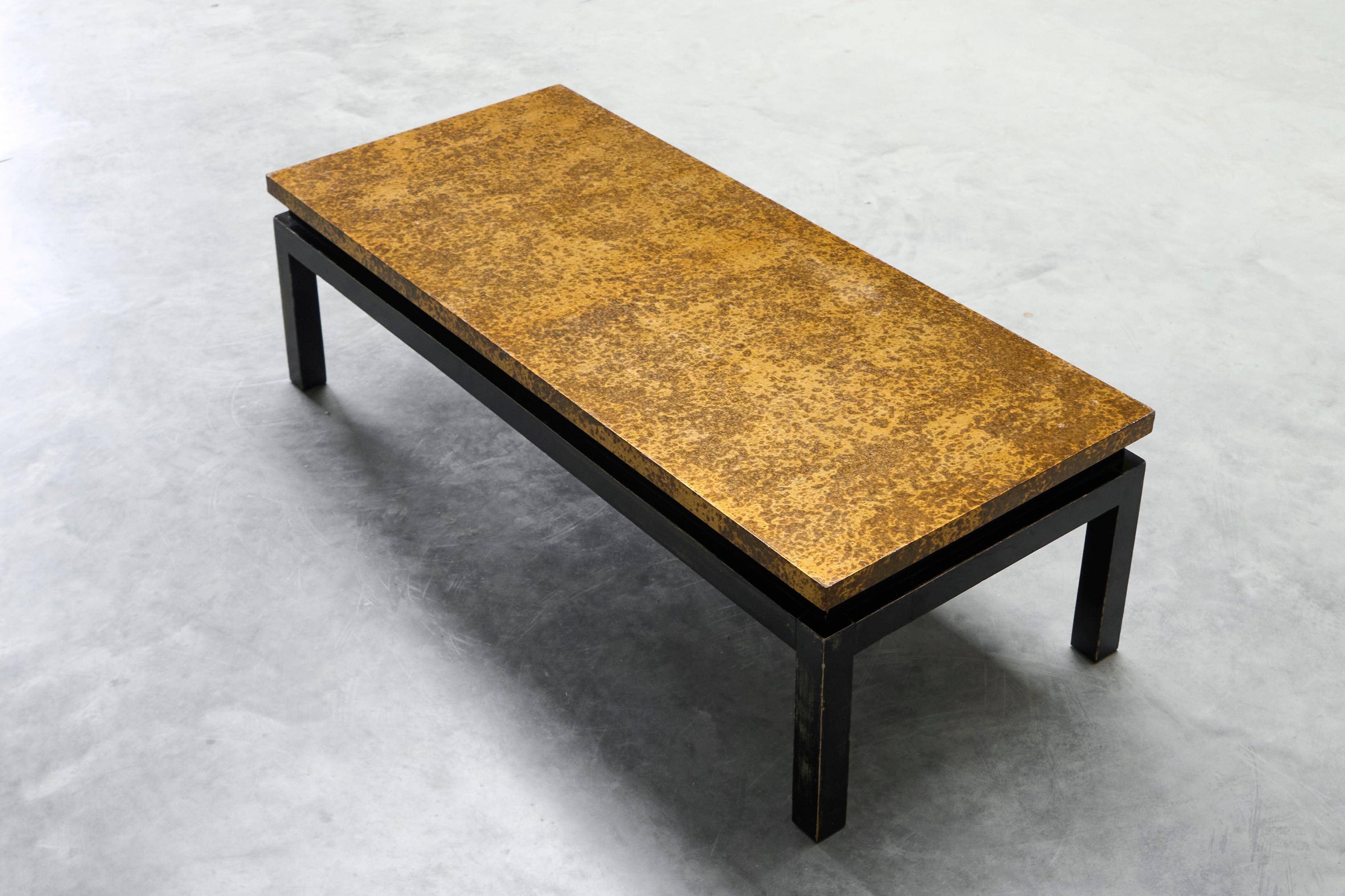 Modernist coffee table with a patinated gold top, 120x52.5x36 cm, mid-20th century.