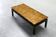 Modernist coffee table with a patinated gold top, 120x52.5x36 cm, mid-20th century.