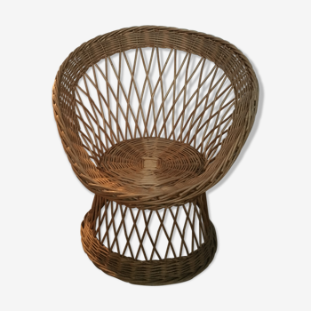 Armchair in rattan basket