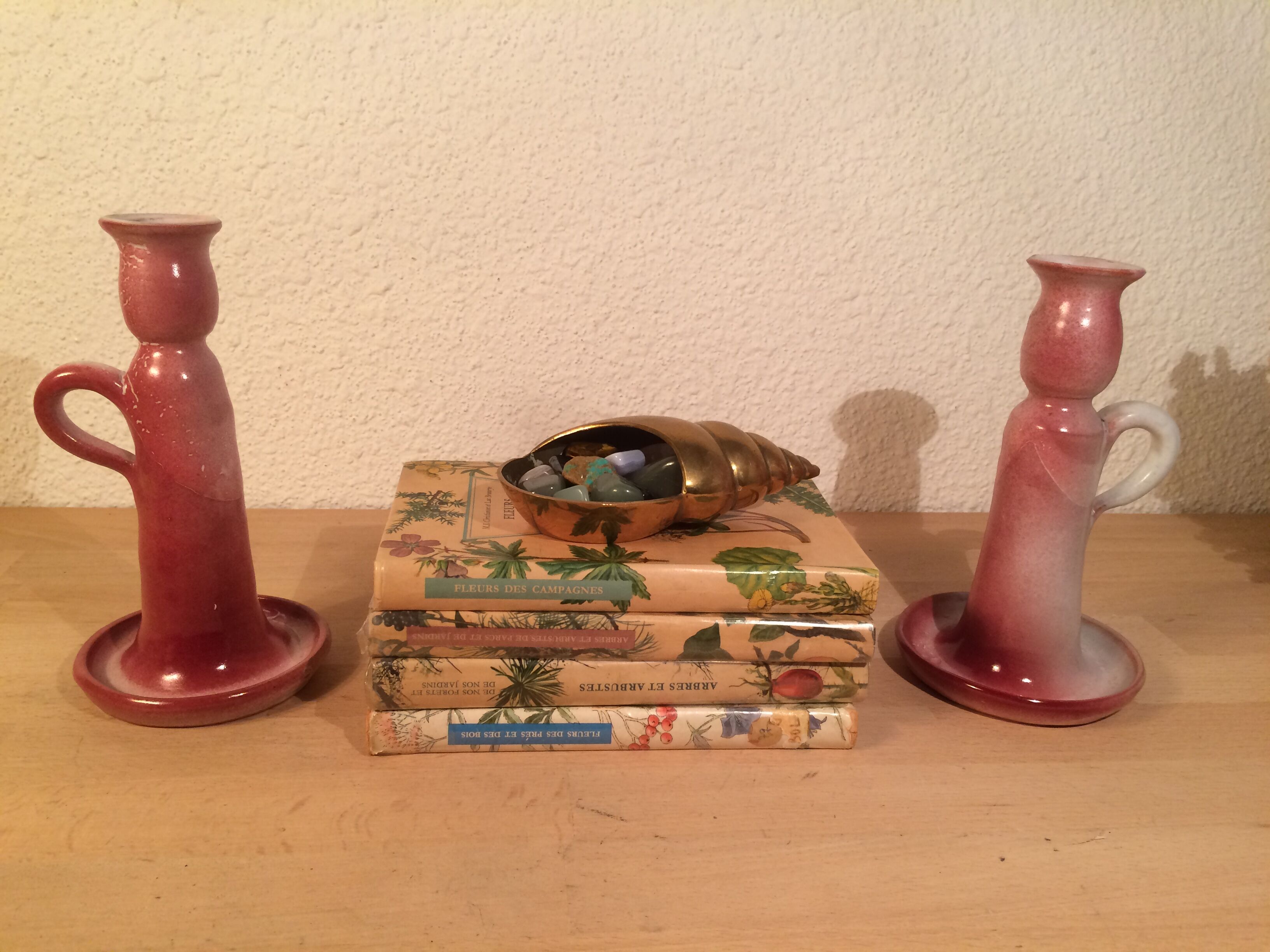 Pair of pink ceramic candle holders