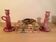 Pair of pink ceramic candle holders