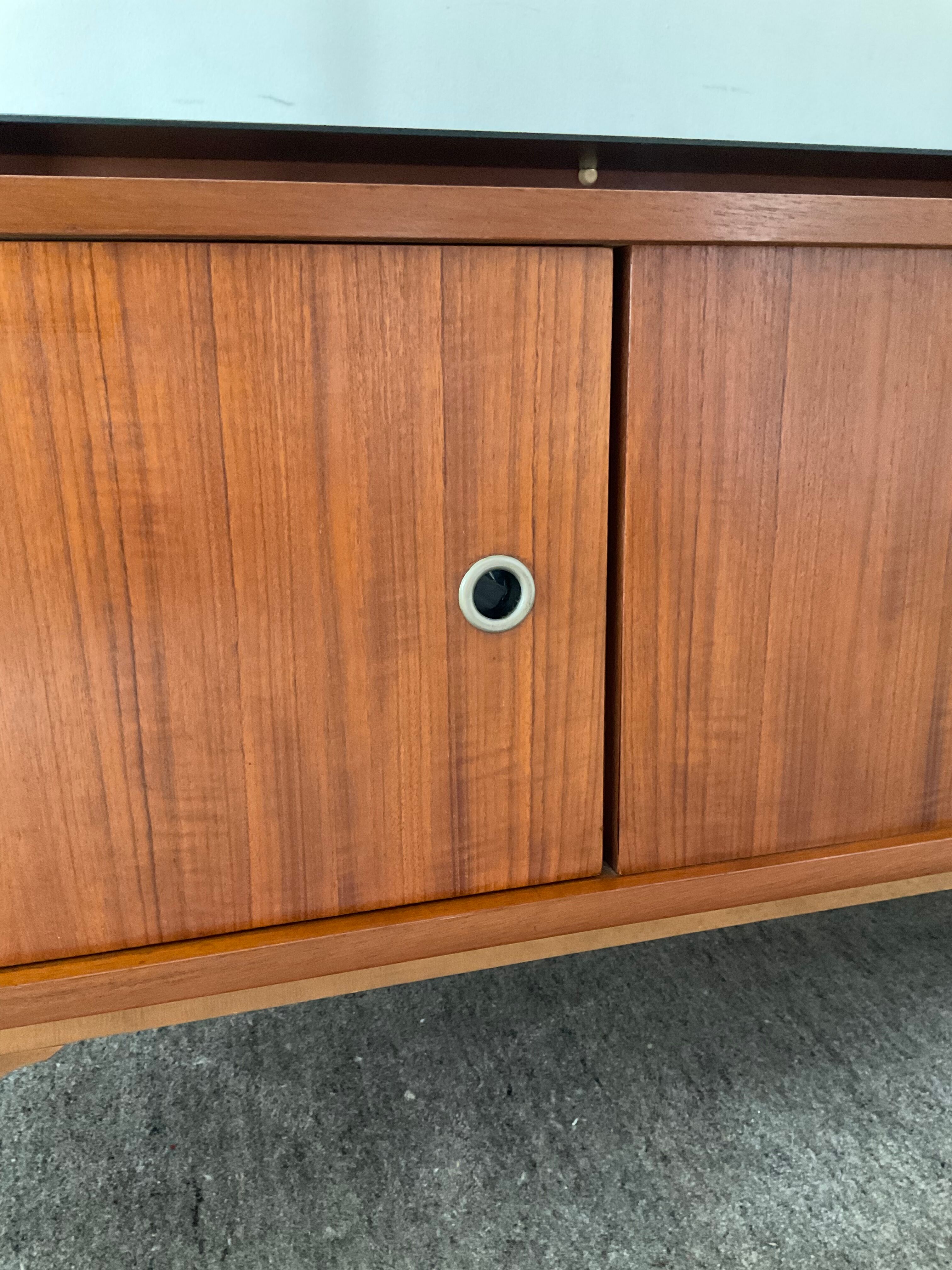 Scandinavian teak row from the 60s